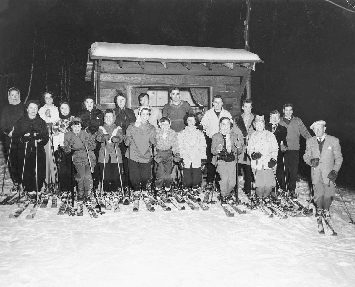 Adams Ski School on Bay Road, circa 1945. The ski area was built for Bruce Adams after World War II to help him rehabilitate. Included in photo are Bruce Adams, Edna Harris, Tom Harrison, and Claude Adams. Courtesy Chapman Historical Museum