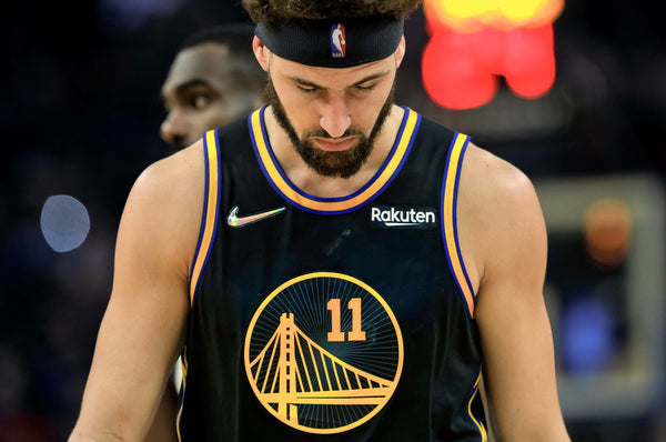 Klay Thompson (11) walks back up court as the Golden State Warriors played the Dallas Mavericks at Chase Center in San Francisco, Calif., on Tuesday, January 25, 2022. Carlos Avila Gonzalez / The Chronicle