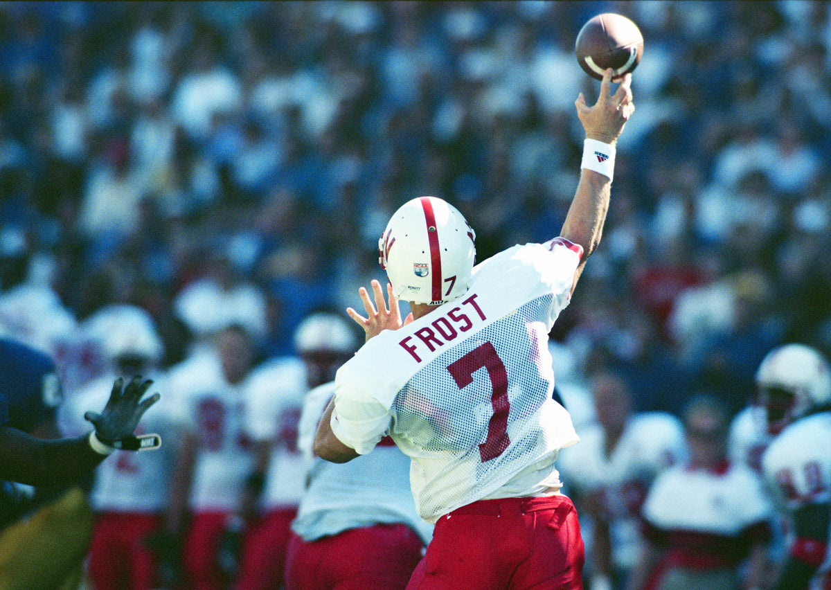 Quarterback Scott Frost launches a pass. Frost scored two rushing touchdowns in the Huskers’ 27-14 win. Courtesy Lincoln Journal Star