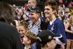 Gonzaga head coach Mark Few gathers around his family after cutting the last strand on the net. The Zags defeated Xavier 83-59 to win the Western Region Final, March 25, 2017, in San Jose, Calif. Colin Mulvany / The Spokesman-Review