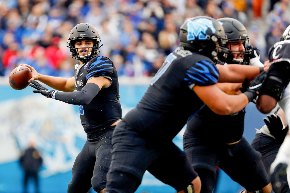 Memphis quarterback Brady White draws back to pass. Courtesy Max Gersh / The Commercial Appeal