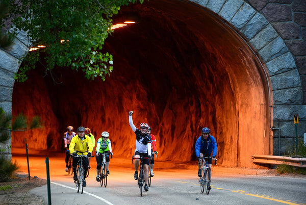Exultant cyclists make their way up Boulder Canyon on the first stage of the tour.  Helen H. Richardson, The Denver Post