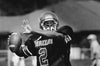 Tyrone Wheatley of Dearborn Heights Robichaud opened his senior season with two touchdown passes, a 52-yard rushing TD and a 35-yard interception return for a TD — plus a two-point conversion — in a 38-0 victory over Redford Thurston. RICHARD LEE/DETROIT FREE PRESS