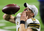 Drew Brees throws a kiss to his family as he runs off the Superdome field after beating the Minnesota Vikings 52-33 on Dec. 25, 2020. David Grunfeld / The Times-Picayune | The Advocate