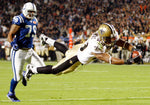 Saints running back Pierre Thomas dives into the end zone on a 16-yard touchdown reception against the Colts. Michael DeMocker / The Times-Picayune | The Advocate