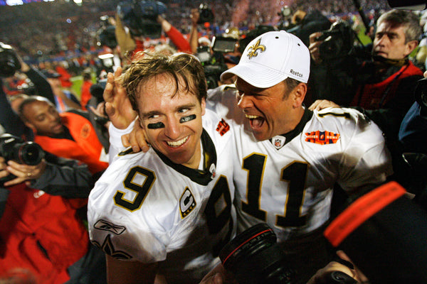 Quarterbacks Drew Brees and Mark Brunell celebrate winning after Super Bowl XLIV in Fort Lauderdale, Fla., in 2010. Michael DeMocker / The Times-Picayune | The Advocate