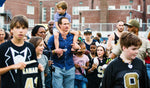 Drew Brees walks around during his back-to-school giveaway event at Lusher Charter School in New Orleans on Aug. 20, 2018. Drew Brees gave away 10,000 button-up shirts to local students. Sophia Germer / The Advocate