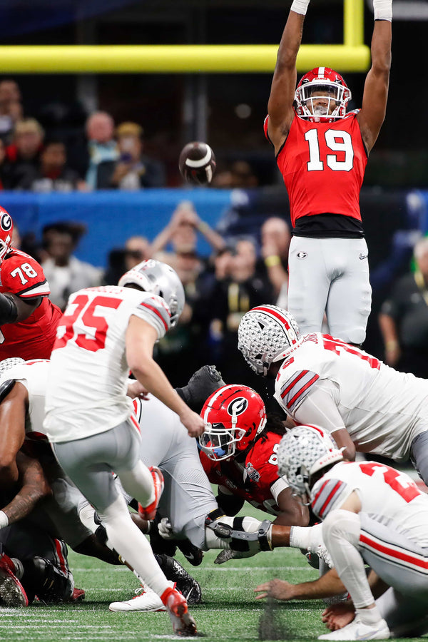 Ohio State place kicker Noah Ruggles (95) misses a possible game-winning kick in the final seconds of the second half. Joshua L. Jones / Athens Banner-Herald