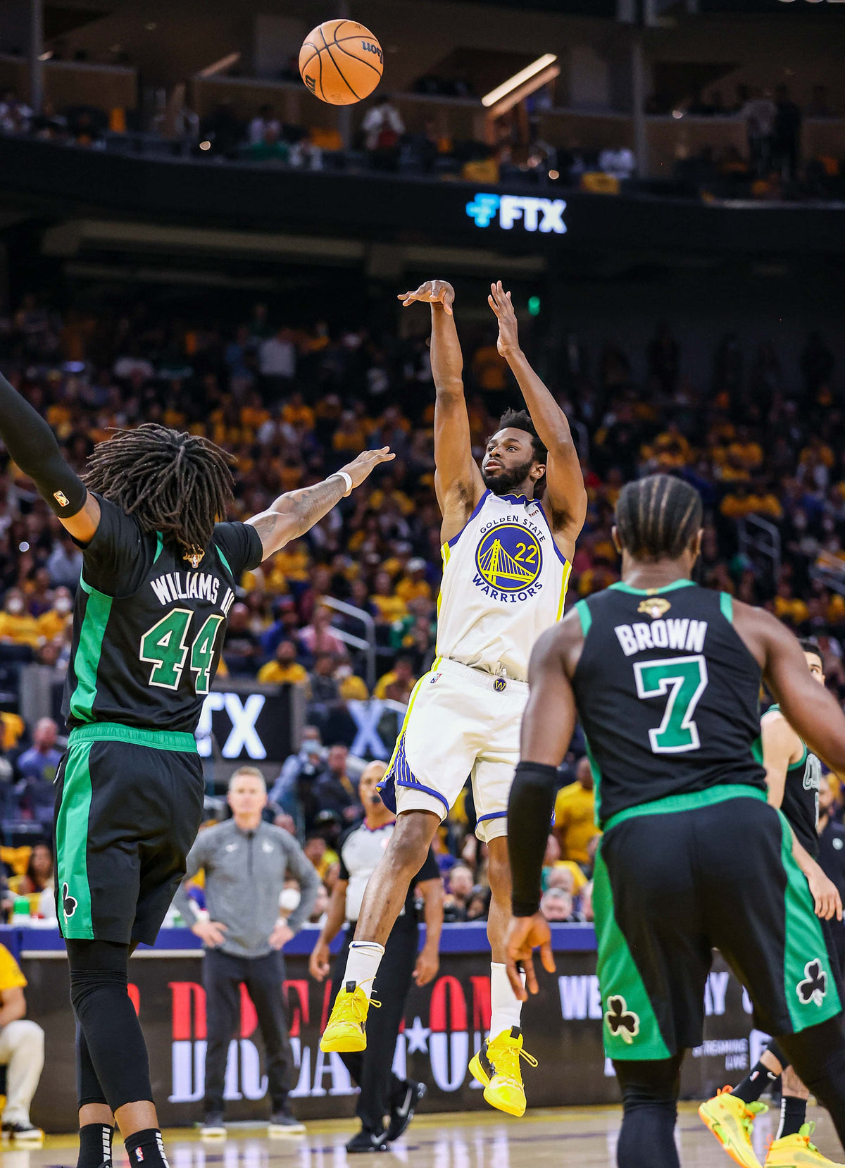 Golden State Warriors' Andrew Wiggins, 22, shoots over Boston Celtics' Robert Williams III, 44, during the third quarter in Game 5 of the NBA Finals at Chase Center in San Francisco, Calif., on Monday, June 13, 2022. Scott Strazzante / The Chronicle
