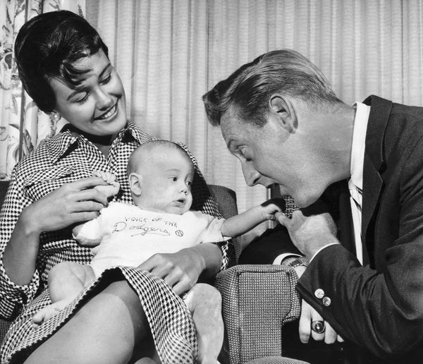 Michael Scully, shown at two months, was the first of Vin Scully’s children. Here, Vin’s wife Joan, holds the infant who is wearing a sweater knitted by Terry O’Malley Seidler, daughter of then Dodgers owner Walter O’Malley. Vin would survive both his first wife and first child. Joan died in 1972 of an accidental overdose of cold and bronchial medicine. Michael died in 1994 in a helicopter crash. LOS ANGELES TIMES