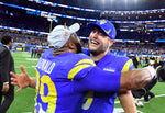 Rams defensive lineman Aaron Donald, left, celebrates with quarterback Matthew Stafford after winning the NFC Championship against the 49ers at SoFi Stadium in Inglewood Sunday. Wally Skalij/Los Angeles Times