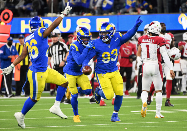 Rams defensive lineman Marquise Copeland (93) celebrates his interception against the Cardinals in the second quarter at SoFi Stadium in Inglewood Monday. Wally Skalij/Los Angeles Times