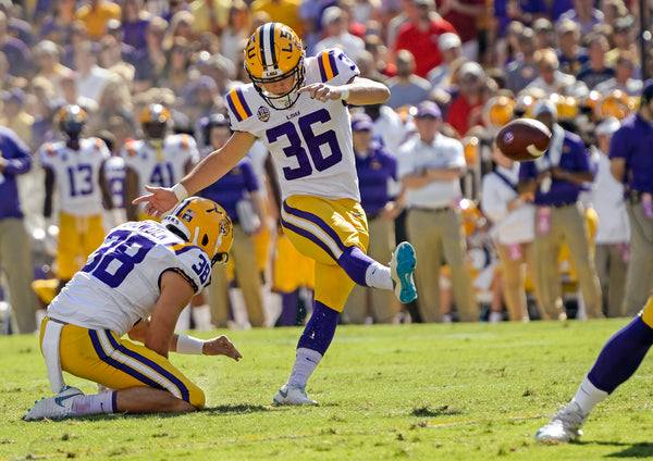 Cole Tracy drills a field goal as punter Josh Growden holds against Georgia on Oct. 13, 2018, in Tiger Stadium. Bill Feig / The Advocate