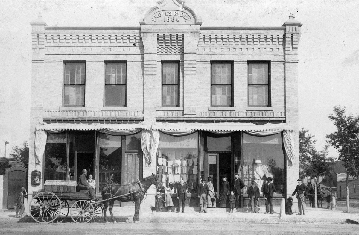People in front of Theodore Knoll’s general Store at the intersection of Third Street and Park Row in St. Peter, 1886. Courtesy Nicollet County Historical Society