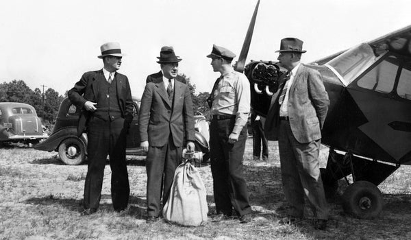 Edgecombe County officials with the first airmail plane in Tarboro, October 12, 1937. Courtesy DigitalNC-Edgecombe County Memorial Library, M. S. Brown Collection