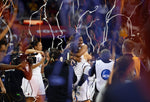 UConn celebrates its 2013 NCAA championship in New Orleans. Tim Martin / The Day