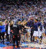 UConn players are showered with confetti after winning the 2010 NCAA championship at the Alamodome in San Antonio, Texas. Sean D. Elliot / The Day