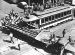 Portland - Four passengers and a streetcar motorman were injured Tuesday when a Montavilla car crashed into a truck loaded with heavy pipe at the corner of S.E. Washington street and Grand Avenue. No one was hurt critically. Courtesy The Oregonian