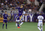 Orlando City’s Brek Shea goes up for a header with Johan Venegas from Montreal during their playoff-critical match. Jacob Langston / Orlando Sentinel