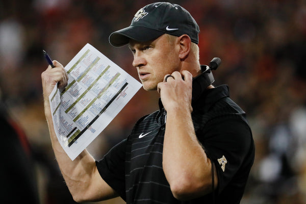 UCF head coach Scott Frost works the sidelines in the first half of the game against Cincinnati. AP PHOTO / John Minchillo