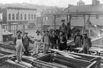 Construction of a building at Central Avenue and Frederick Street in Staunton. The tower of the firehouse and, next to it, Staunton High School, can be seen in the background. Courtesy Schwartz Collection
