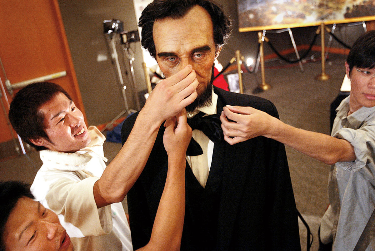 From left, Keisuke Ki Ku Chi, 19, Yuki Kurasawa, 19, and Tosiyasu Ooyanagi, 21, from Ashikaga City, Japan, are surprised by the realness of a statue of Abraham Lincoln while on a tour through the Abraham Lincoln Presidential Library, Sept. 15, 2003. The tour is just one of the many things the engineering and architecture students will be doing on their four-week visit to Springfield, their sister city. 2003/The State Journal-Register