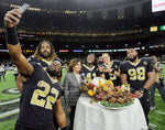 In a post-game interview with NBC, Mark Ingram takes a selfie with Cam Jordan, Alvin Kamara, Drew Brees and Sheldon Rankins, Nov. 22, 2018. David Grunfeld / NOLA.com | The Times-Picayune