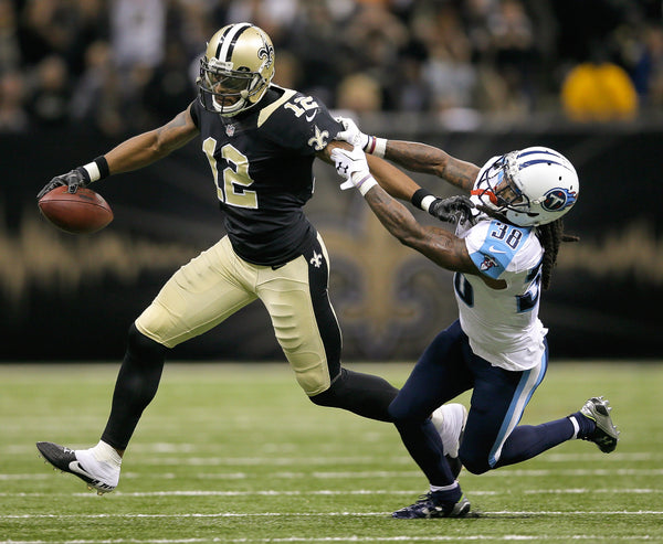 New Orleans Saints wide receiver Marques Colston (12) is taken down after gaining enough yardage to get the Saints in comfortable field goal range, Nov. 8, 2015. David Grunfeld / NOLA.com | The Times-Picayune