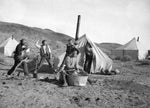 A group of men mug for the camera outside a mining camp tent in Las Vegas, circa 1915. Courtesy Ferron-Bracken Photo Collection, UNLV University Libraries Special Collections & Archives
