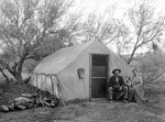 A couple with a dog outside a tent near the Las Vegas Creek, Las Vegas, circa 1904. Courtesy Helen J. Stewart Collection, UNLV University Libraries Special Collections & Archives