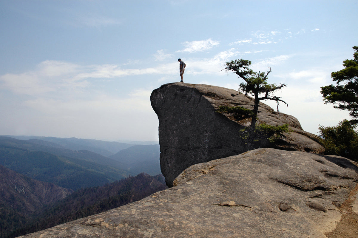 A viewpoint atop Hanging Rock looks 3,500 feet down into the wild valley of the Rogue River