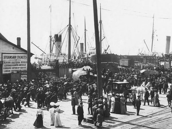 Crowds gather at the Seattle waterfront circa 1890 as steamships load up prospectors seeking to find their fortune in the Klondike Gold Rush. Courtesy Seattle Public Library