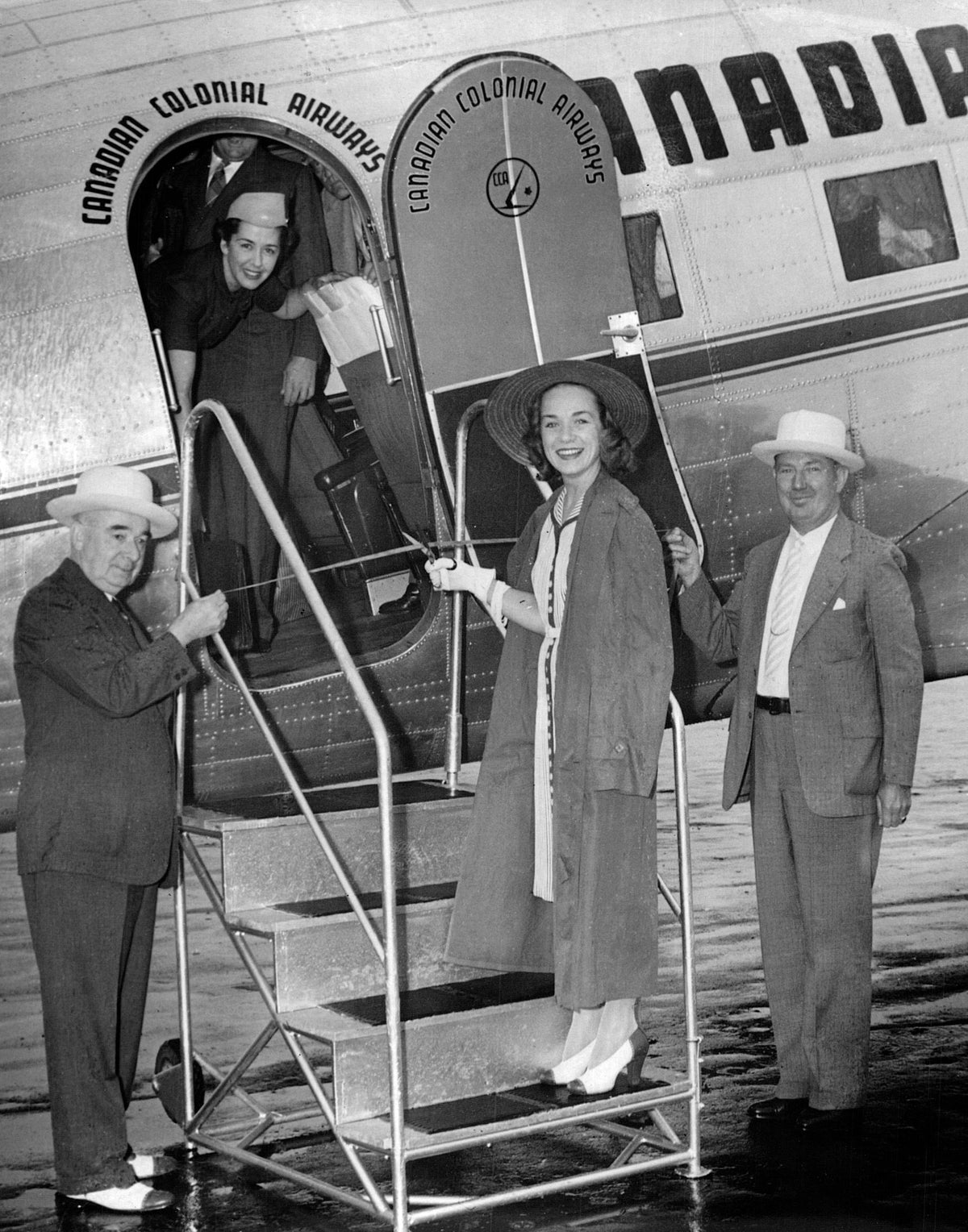 Dion Lasher cutting the ribbon to open the new New York-Montreal service at Schenectady County Airport, flanked by Postmaster James C. McDonald (left) of Schenectady and Postmaster John P. Hayes of Albany, 1940. At the time, the Albany Airport was closed to commercial plane traffic due to “government red tape.” Courtesy Times Union Historic Images
