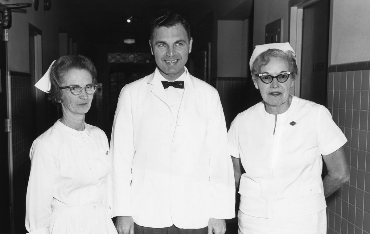 Three members of the infirmary staff of Mary Washington College, December 21, 1964. From left: Bessie Olive, Joseph MacKnight, Inez Watson. Courtesy University of Mary Washington, Special Collections & University Archives.