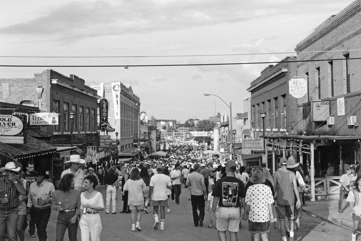 Looking east on Exchange Avenue toward Main Street during the Chisholm Trail Round-Up in the Fort Worth Stockyards, 1993. The Round-Up was a popular annual event in Fort Worth during the 1990s. The 1993 Round-Up recorded upwards of 100,000 visitors in just one day of the three-day event. Courtesy Steven Martin