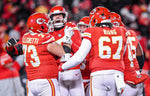 Kansas City Chiefs place kicker Harrison Butker, center, celebrates with teammates after he kicked a field goal to defeat the Cincinnati Bengals 23-20 during the AFC Championship Game Sunday, Jan. 29, 2023, at GEHA Field at Arrowhead Stadium. (Nick Wagner/The Kansas City Star)