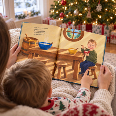 A parent and child reading Danny's book together on Christmas morning